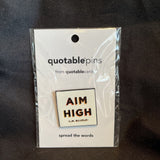 Quotable pin "Aim High -L.M. Bujold-"